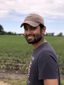 A photo of Dr. Suresh Niraula in the field.